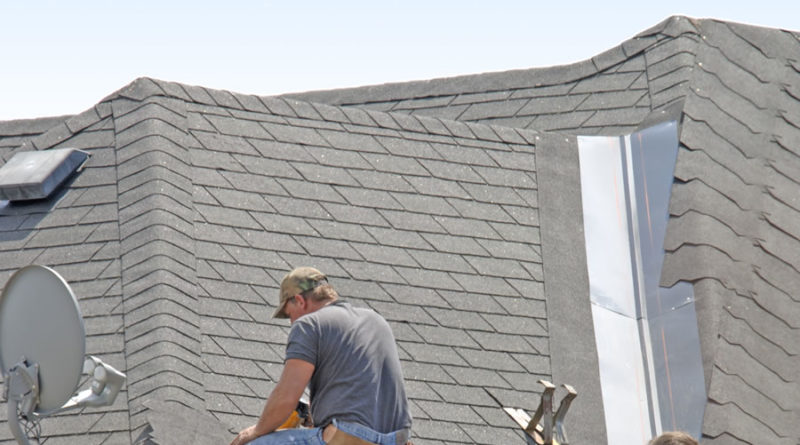 Roof Contractor in Grand Rapids Michigan Installing 3 Tab Shingles
